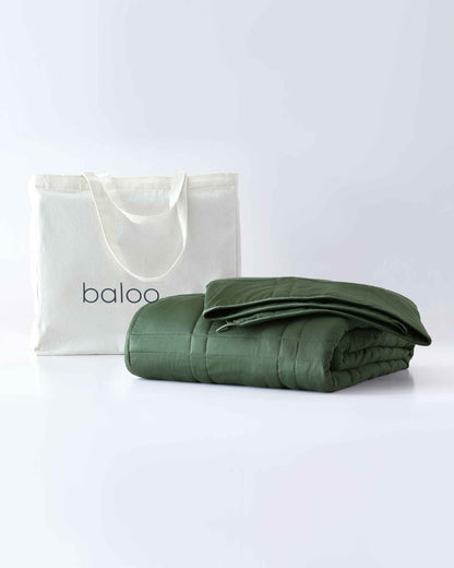 folded weighted blanket in spruce green against an empty background [44422820561115, 45574418333915, 44422814826715, 46452818542811, 44422813090011, 46452818575579, 44422818234587, 46452819099867,46061921730779, 46061921763547, 46061921796315, 46063267709147, 46063269118171, 47185820057819, 47185820090587, 47185820156123, 47185820188891]
