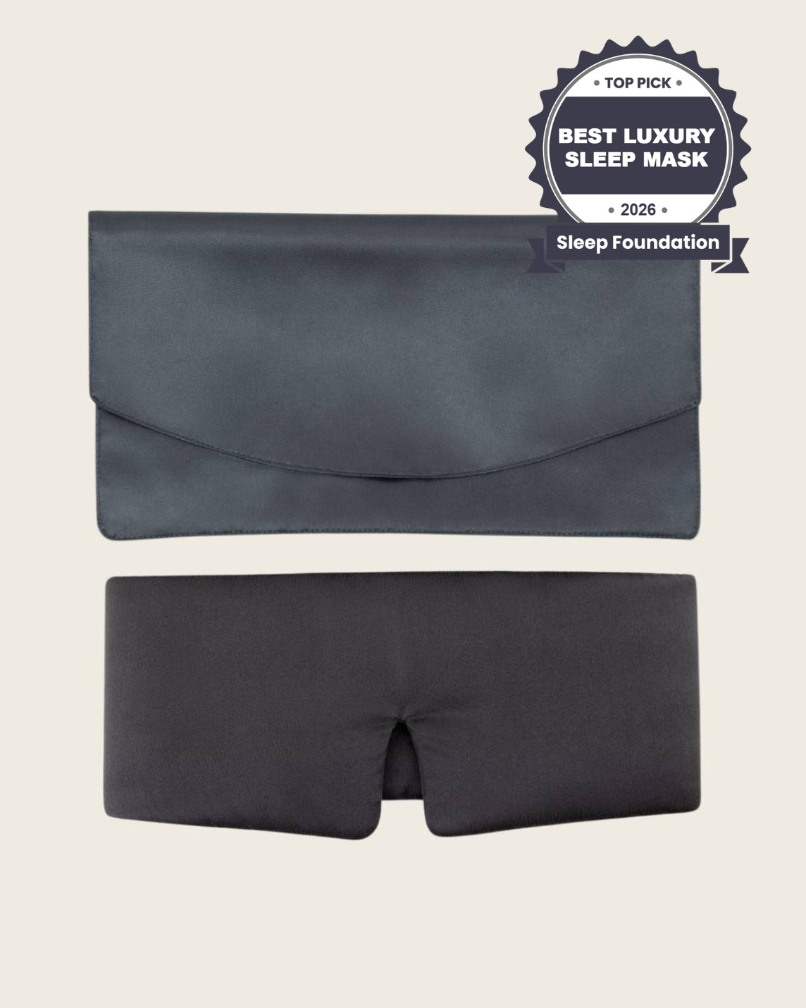 Grey silk sleep mask flatlay next to the pouch.