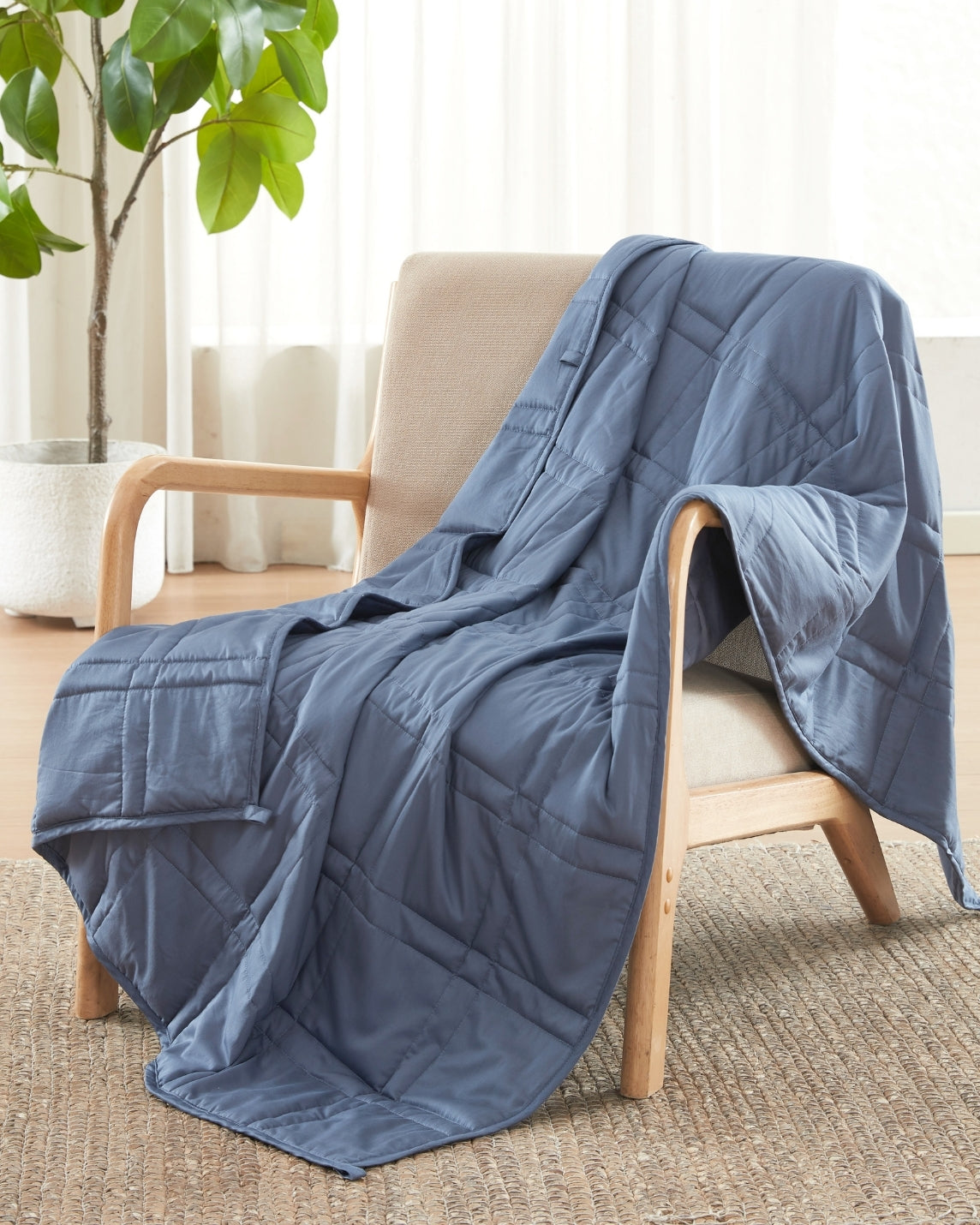 dusk blue weighted blanket draped over a chair  [47867971928283, 47867972092123, 47867972190427, 47867972288731, 47868867838171, 47868894413019, 47868894445787, 47868894478555, 47868894511323, 47868895461595, 47868895494363, 47868895527131]