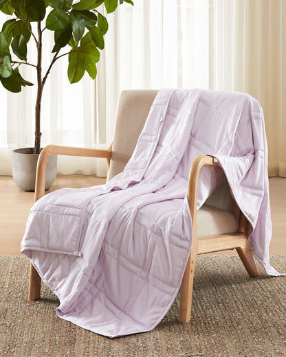 lavender weighted blanket draped over an chair [47867972059355, 47868894937307, 47868894970075, 47868895002843, 47868895035611, 47868895854811, 47868895887579, 47868895920347, 47879290454235]